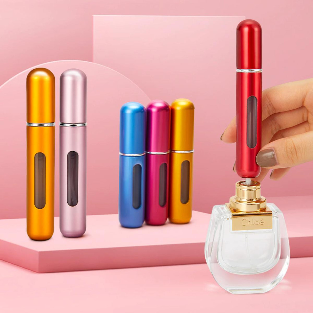 Mini Portable Refillable Perfume Bottle ( এক পিছ কিনলে এক পিছ ফ্রী.....)